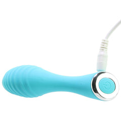 Little Dipper rechargeable vibrator showing USB charging cable and silver power button
