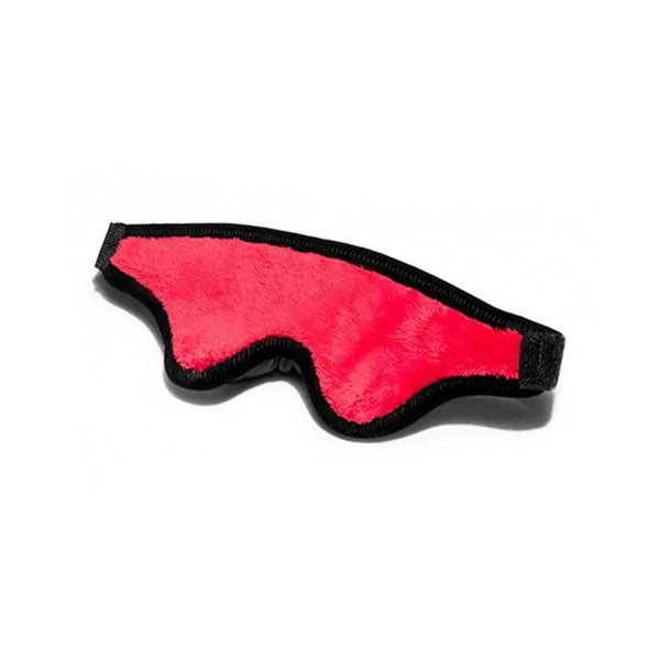 Liberator Black Label Loveblind Plush Blindfold in red with black stitched trim, flat lay view