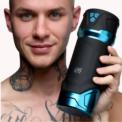 Love Botz Auto Milker Intense male masturbator held by a tattooed man, black and blue finish