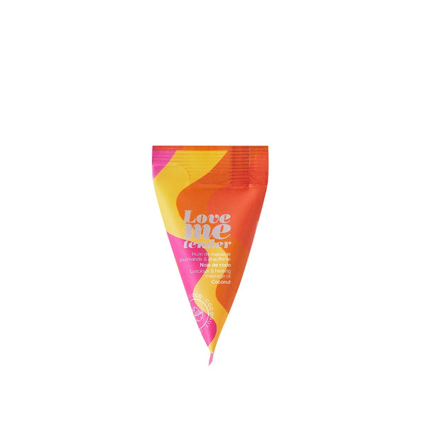 Love Me Tender massage oil sachet by Love to Love, triangle-shaped in warm orange and pink tones