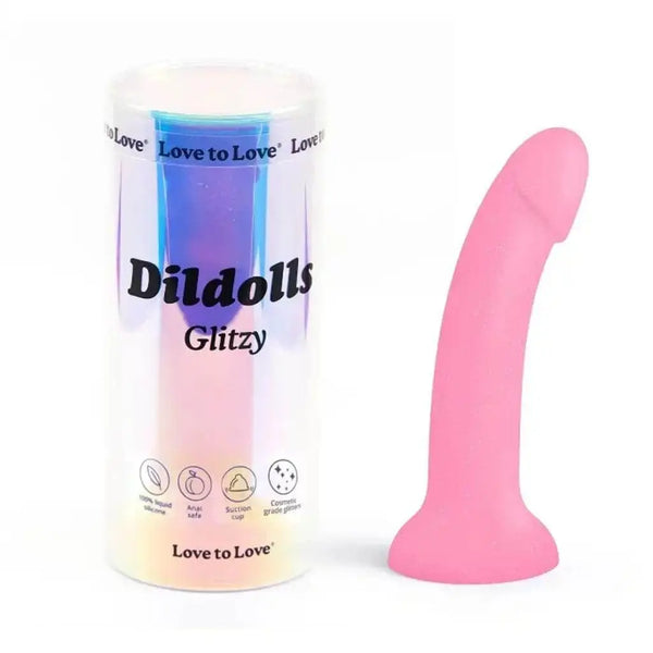 Love to Love Dildolls Glitzy pink silicone dildo beside its iridescent cylindrical packaging