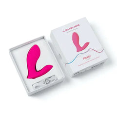 Lovense Flexer vibrator displayed inside open white retail box alongside USB charging cable