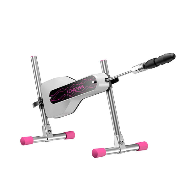 Lovense Mini Sex Machine angled side view with black attachment connected, showing thrust rod extension