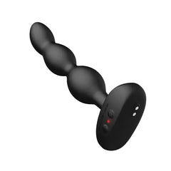 Lovense Ridge anal vibrator tilted to show dual control buttons and charging contacts