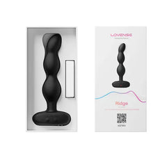 Lovense Ridge open retail box displaying device nestled in white molded insert tray