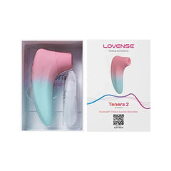 Lovense Tenera 2 unboxed alongside magnetic charging cable in open product packaging