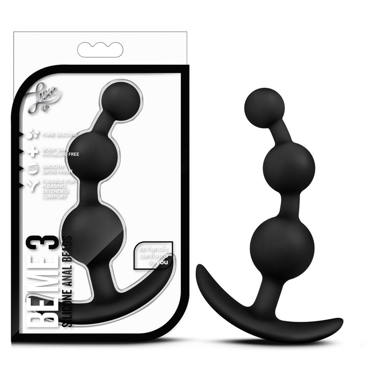 Luxe Be Me 3 black silicone anal beads beside retail packaging, showing graduated bead design