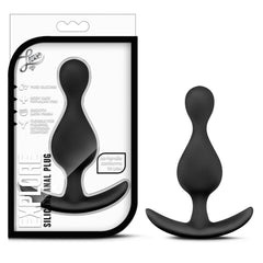 Luxe Explore Silicone Anal Plug in black shown beside its retail packaging box