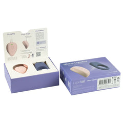 LUXUS Climax Together gift box open displaying pink stimulator, blue ring, and quick-start guide