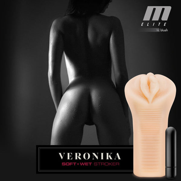 M Elite Veronika soft-wet stroker displayed beside included bullet vibe with branded lifestyle backdrop