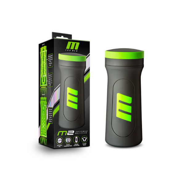 M for Men M2 Superior Stroker in black with green accents beside its retail box