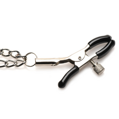 Macro close-up of black rubber-tipped alligator clamp with knurled screw pressure adjuster