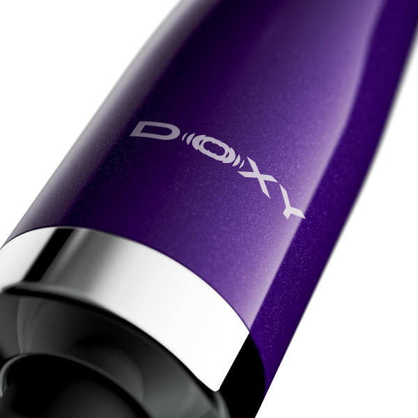 Macro detail of Doxy logo engraved on metallic purple die-cast aluminium handle