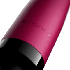 Macro detail of matte pink body showing embossed DOXY logo and smooth soft-touch finish
