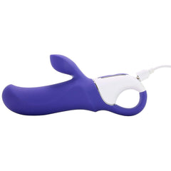 Magic Bunny rabbit vibrator lying flat with white magnetic charging cable attached to handle
