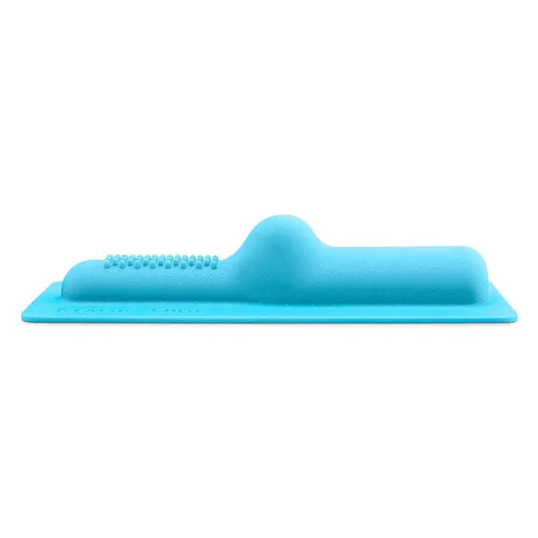 Magic Hide silicone non-penetrative attachment by The Cowgirl, side profile view, aqua blue