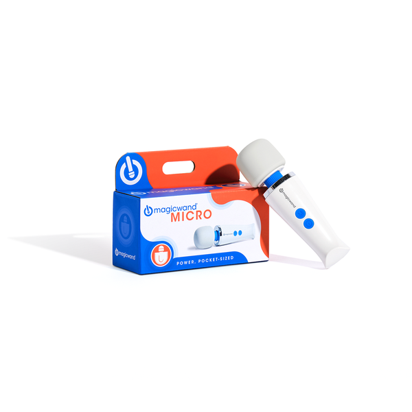 Magic Wand Micro rechargeable wand beside its blue and orange retail box with carry handle