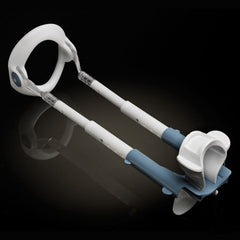 Male Edge penis extender assembled showing white rods, ring, and blue base support cradle
