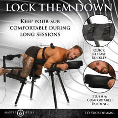Male model positioned on padded bench with quick-release buckle restraints securing arms and legs