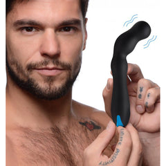 Man holding the 12X Silicone Beaded Prostate Vibrator with a blue charging port visible