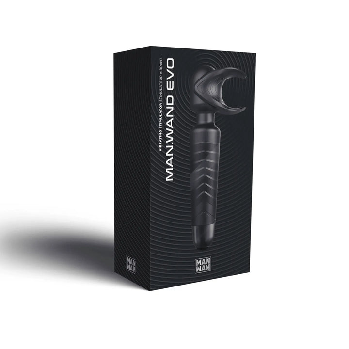 Man.Wand Evo vibrating stimulator in matte black shown on dark textured product box