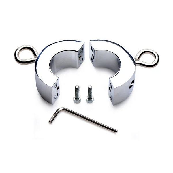 Master Series Ball Trap metal ball stretcher disassembled, showing two chrome halves, screws, and hex key