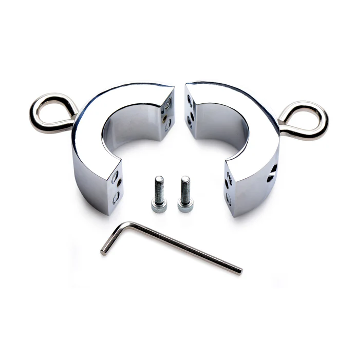 Master Series Ball Trap metal ball stretcher disassembled, showing two chrome halves, screws, and hex key