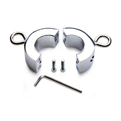 Master Series Ball Trap metal ball stretcher disassembled, showing two chrome halves, screws, and hex key