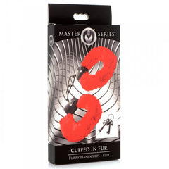 Master Series Cuffed in Fur red furry handcuffs in black retail packaging with keys
