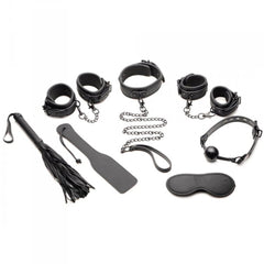 Master Series Master of Kink 10-piece black bondage set laid flat showing all included accessories