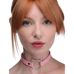Master Series Kinky Kitty pink faux-leather choker with silver cat-ear ring, worn as a slim neckband