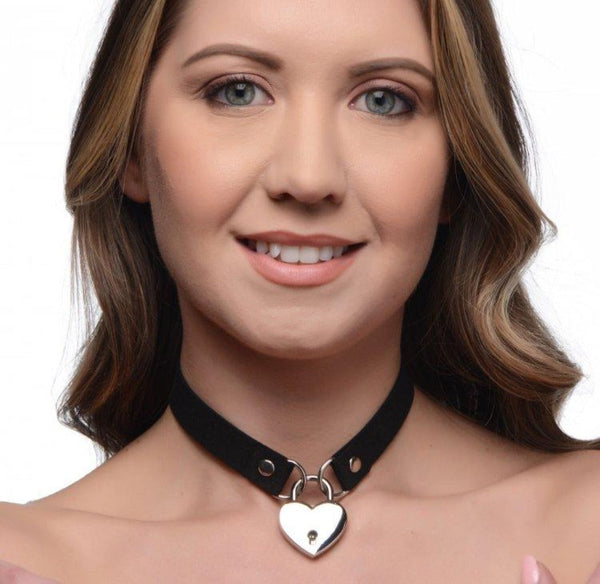 Master Series Lock-It Heart Choker worn as a black velvet choker with silver heart padlock pendant