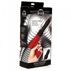 Master Series Pistol Pounder retail box held in hand, displaying product artwork and thrusting vibrator label