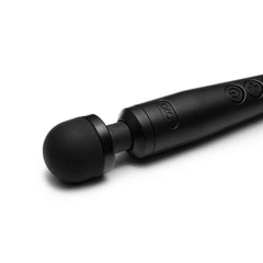 Close-up of the matte black silicone head and neck of the Doxy 3 wand massager showing texture