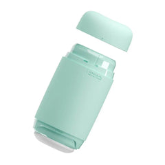 Mint green Tenga Puffy with cap removed, revealing inner sleeve compartment