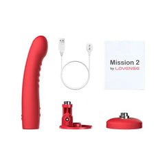 Mission 2 complete contents: vibrator, USB magnetic charging cable, base, and manual