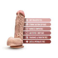 Mr D realistic dildo displaying key features: soft feel, suction base, harness compatible, body-safe material