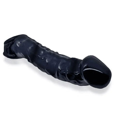 Close-up of Muscle Bandit black sheath showing textured ribbed surface and open base ring detail