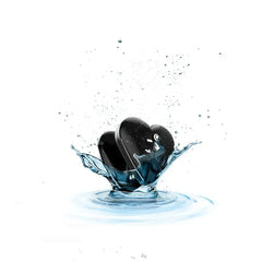 Mystim Heart's Desire black vibrator splashing into water, highlighting waterproof design