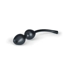 Close-up of Mystim Jane Wonda duo kegel balls showing smooth silicone texture and curved retrieval cord