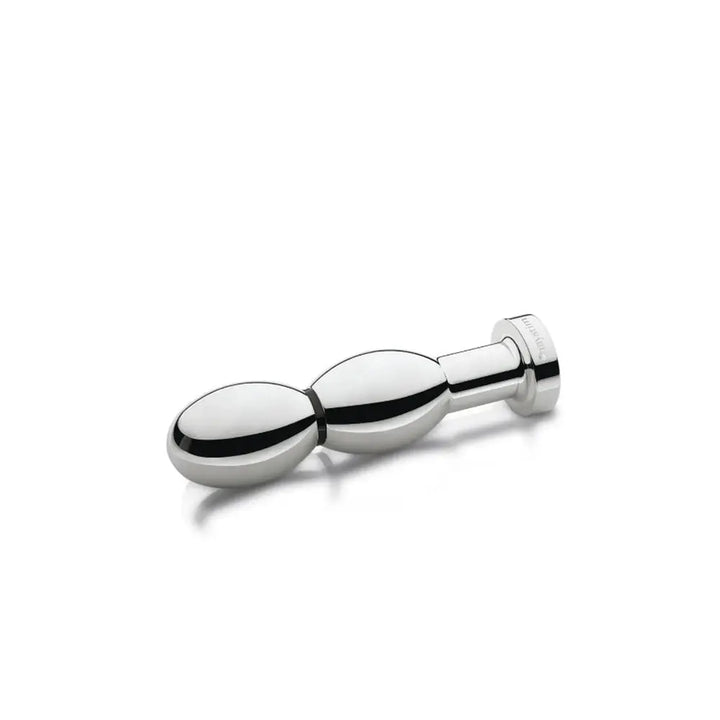 Mystim O(h!)-thello polished stainless steel oval dildo shown at a side angle
