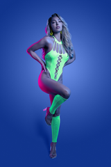 Neon green knit teddy with cutout chest panel and fishnet leg warmers styled as alternative accessory