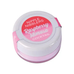 Nipple Nibblers Raspberry Mimosa balm in closed white and pink compact container, side angle
