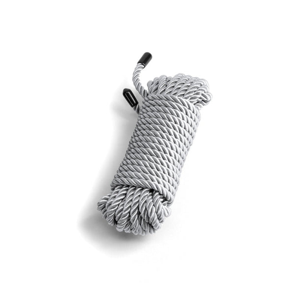 NS Novelties Bound silver twisted rope coiled neatly, with black capped ends, 25 ft