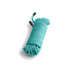 NS Novelties Bound teal twisted rope coiled neatly with black-tipped ends, 25 ft
