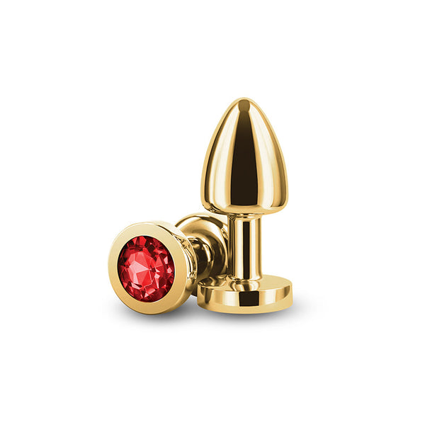 NS Novelties Rear Assets Petite gold aluminum anal plug with red gemstone base, two pieces shown