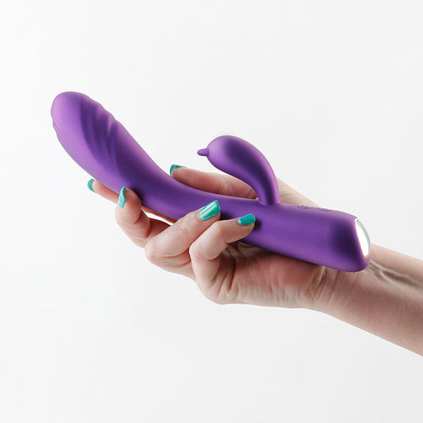 NS Novelties Royals Duchess rabbit vibrator in metallic purple held in a hand