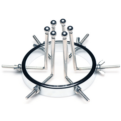 Oculus Stainless Steel Anal Explorer lying flat, ball-tipped rods fully retracted, top-down angle
