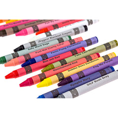Close-up of Offensive Crayons tips and printed color name labels, varied hues