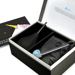 Open b-Vibe retail box revealing neatly organized anal bulb, lube applicator, travel pouch, and storage tray
